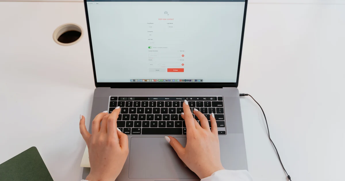Person filling out an online application form